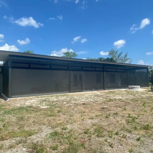 A street-view of aluminum insulated panels for a backyard patio.